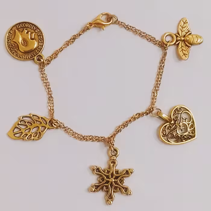 دستبند با آویز خرج کارهای مختلف