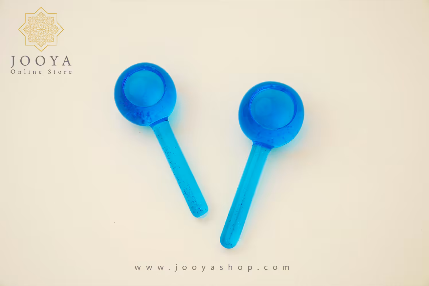 ماساژور دستی شیشه ای مدل گوی یخی آبی