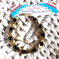 دستبند سنگ حدید طلایی و سنگ اونیکس براق