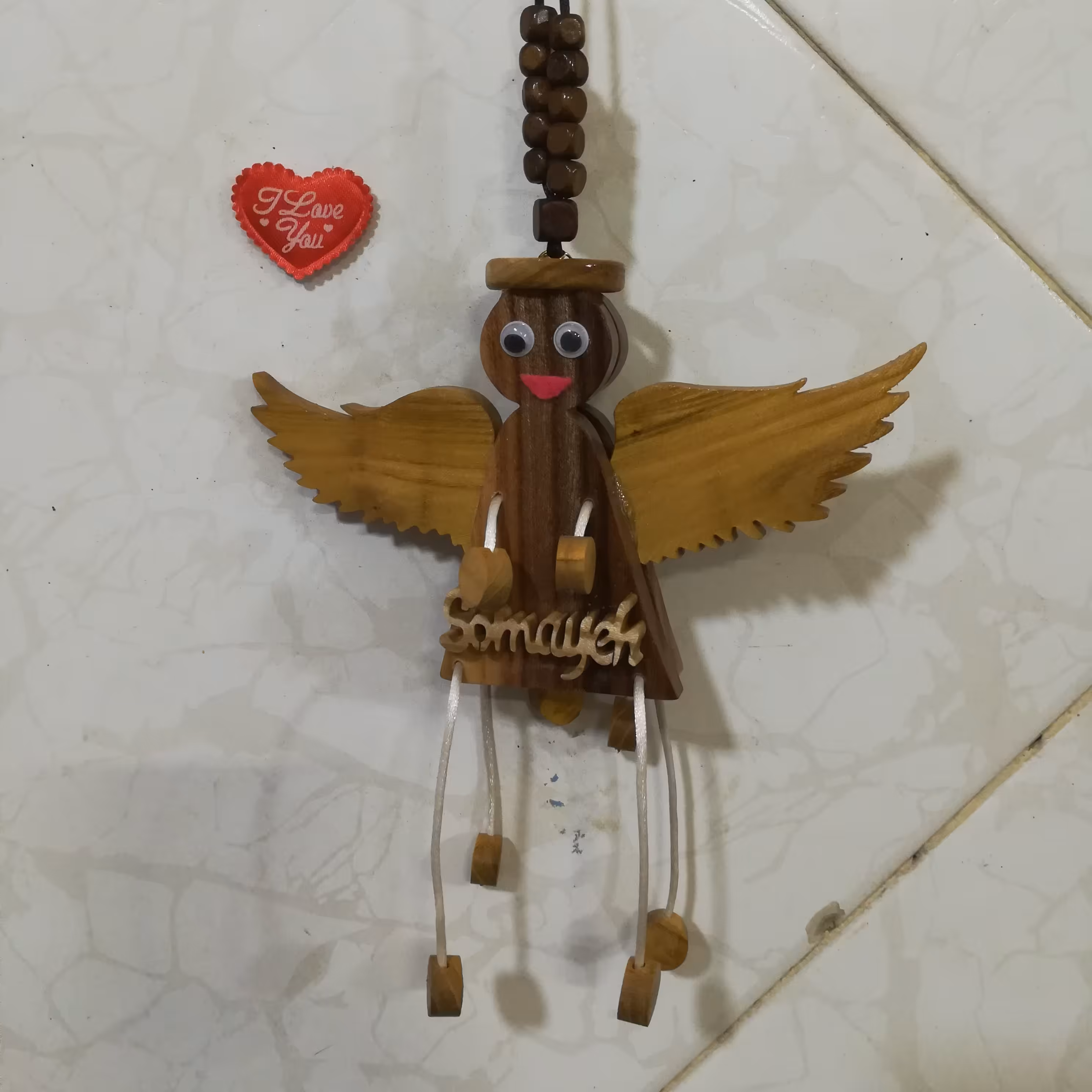 آویز ماشین طرح فرشته دو  صورت  به همراه اسم 