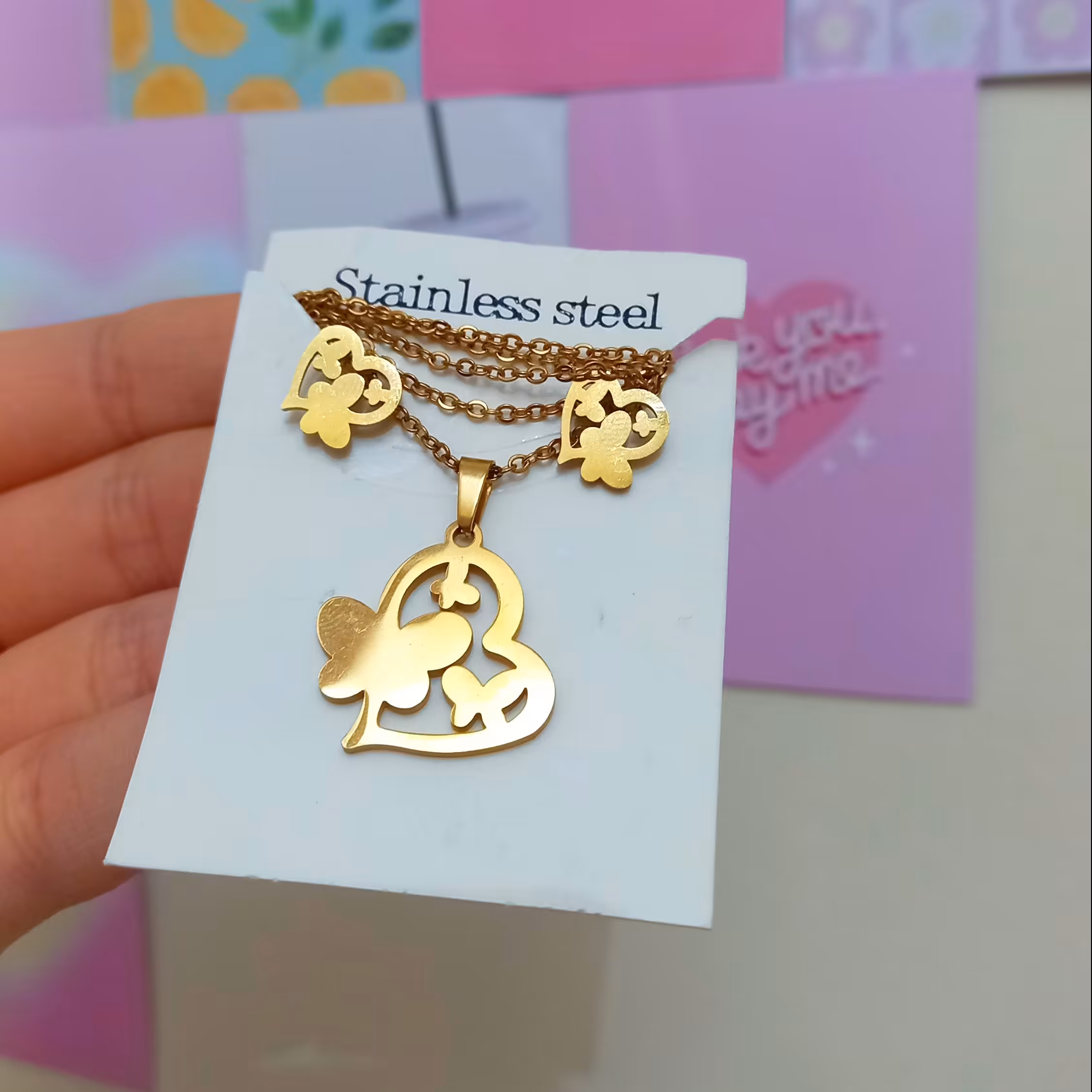 نیم ست قلب و پروانه طلایی استیل