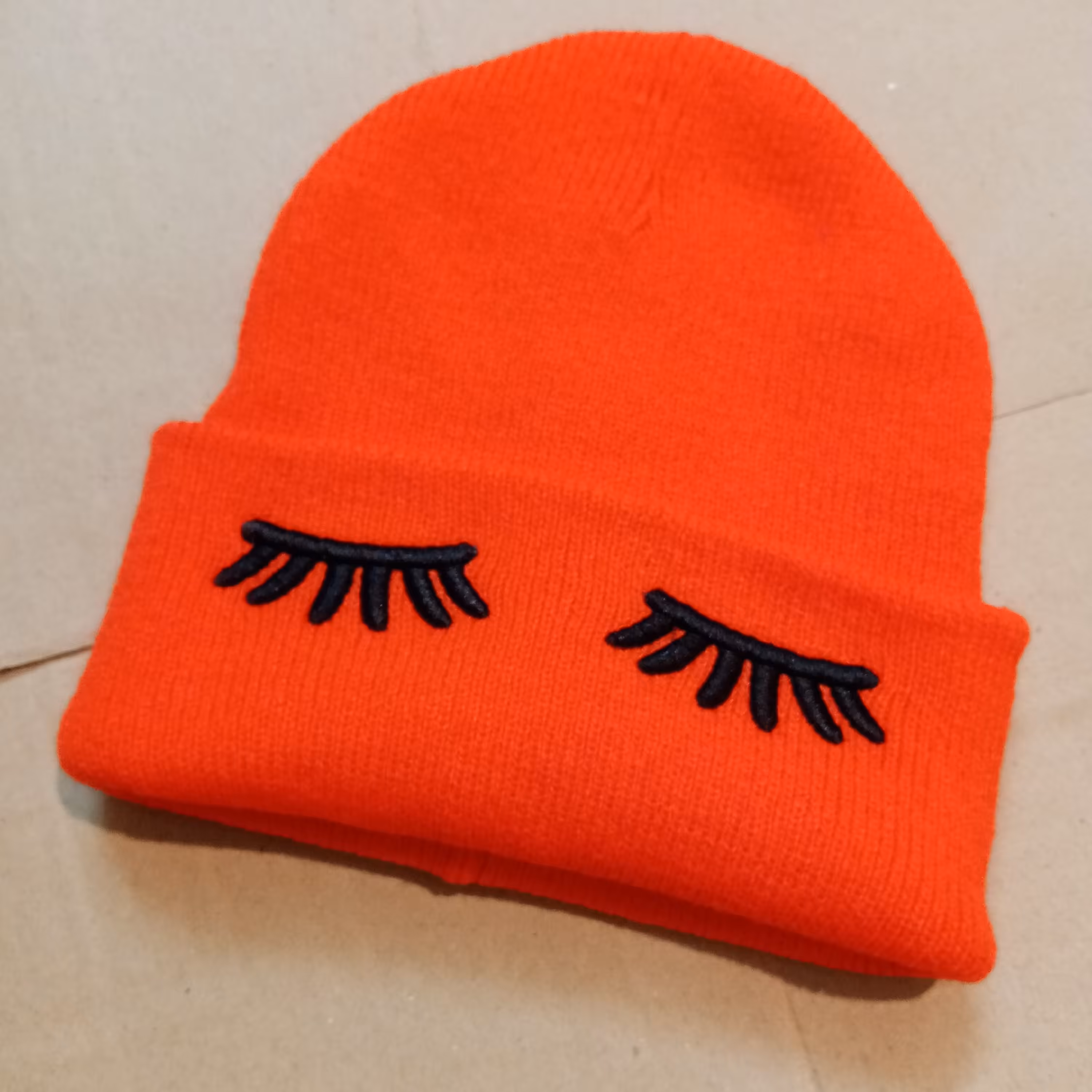 کلاه بافت زمستانه طرح چشم نارنجی دخترانه همراه با ارسال رایگان 