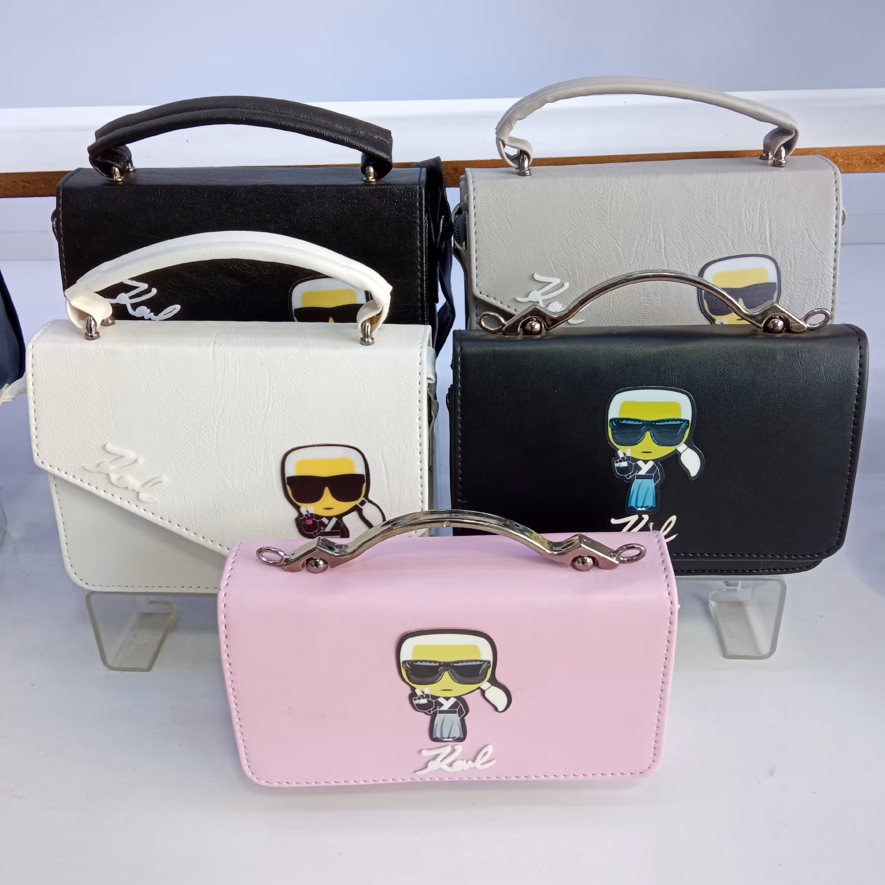 کیف پاسپورتی دخترانه مدل عروسکی