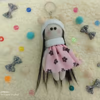 عروسک روسی جاکیلیدی 15سانتی سفید صورتی