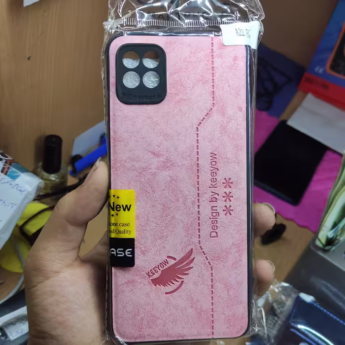 قاب طرح چرم سامسونگ A22 5G رنگ صورتی ژله ای و نشکن ارسال به تمام ایران 