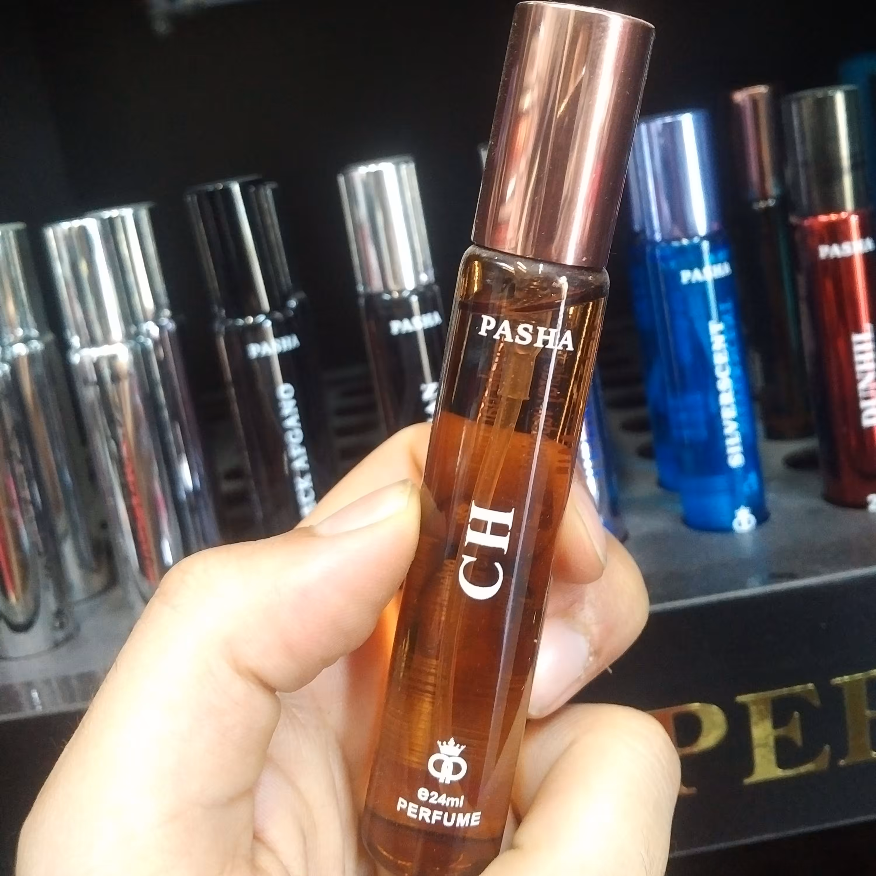 عطر جیبی مردانه پاشا رایحه سی اچ CH حجم 22 میل
