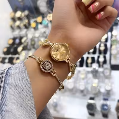 ست ساعت و دستبند زنانه طلایی مجلسی