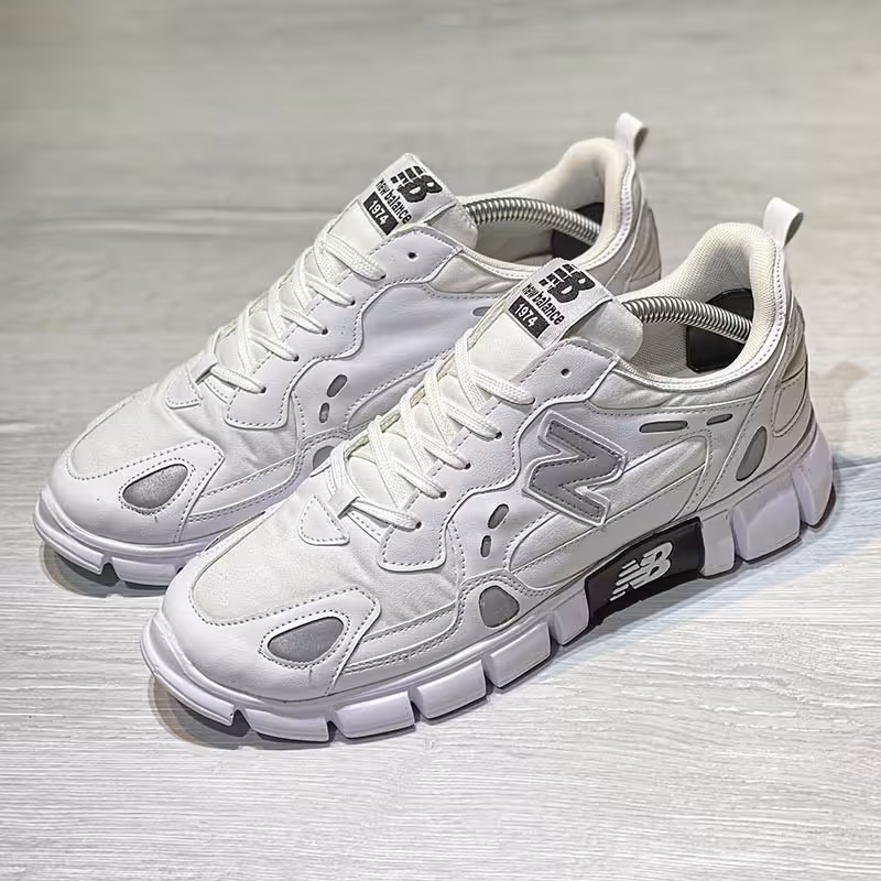  کتونی مردانه مدل نیوبالانس رنگ سفید رویه بافت و زیره pu کد 679192