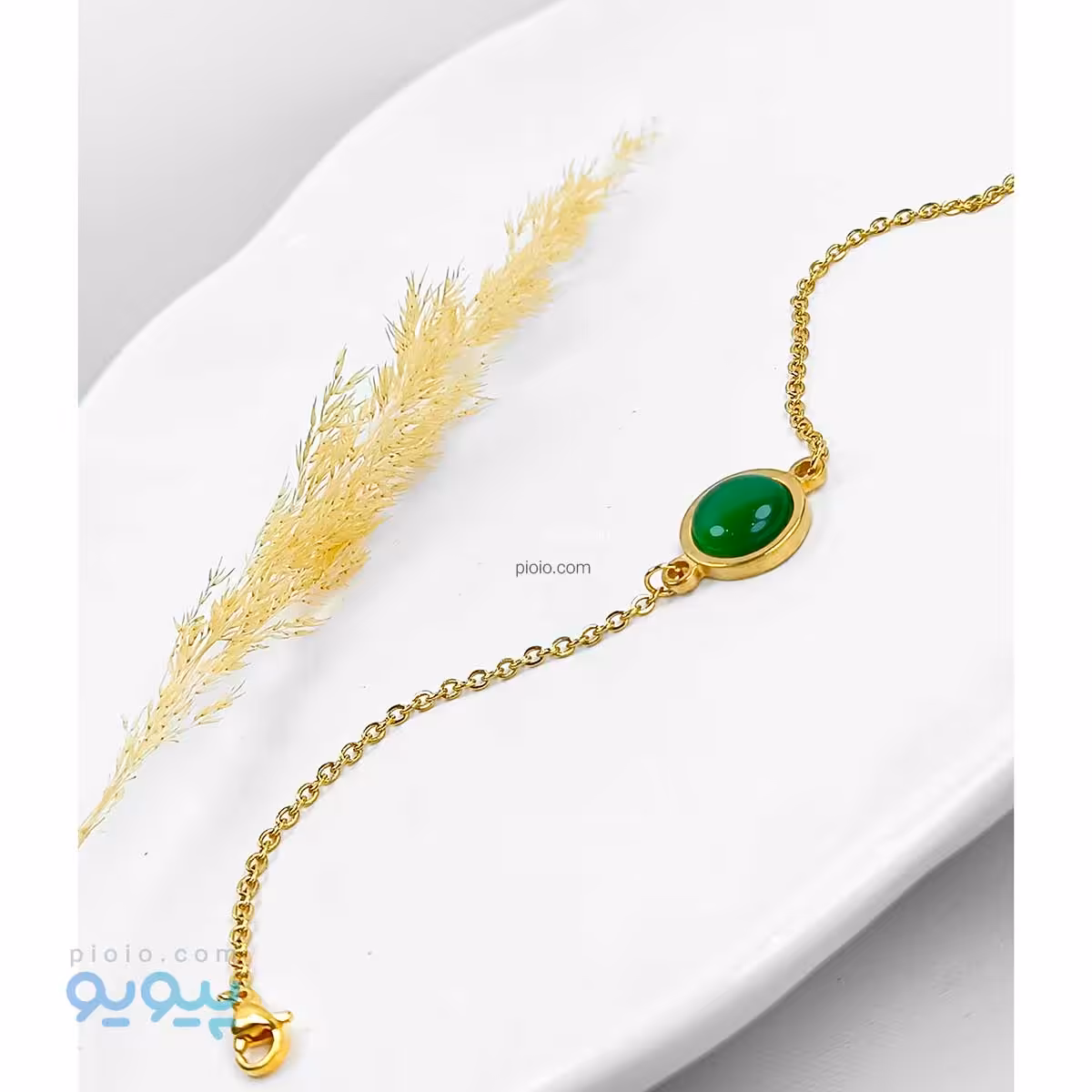 دستبند طرح نگین زمرد