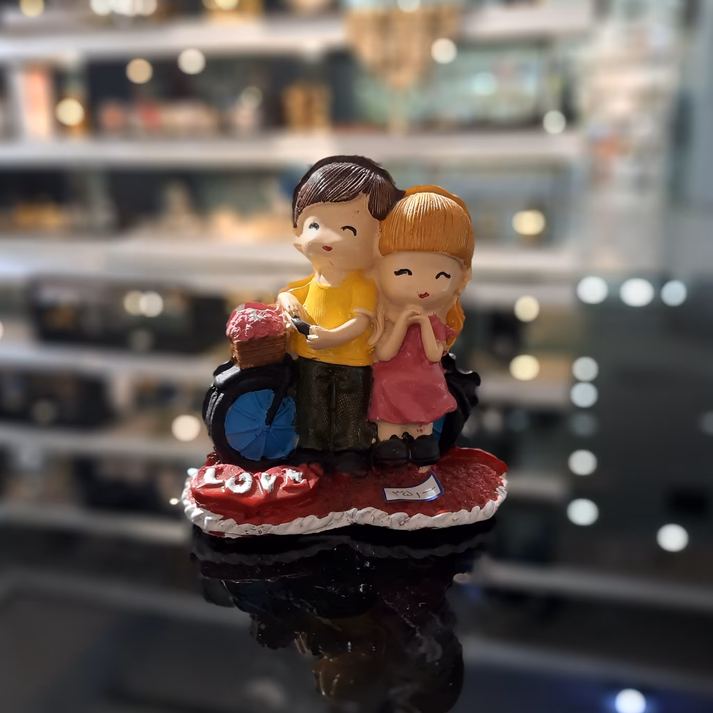 مجسمه دختر و پسر لاو دوچرخه