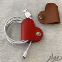 جای سیم شارژر و جای هندزفری.چرم طبیعی 