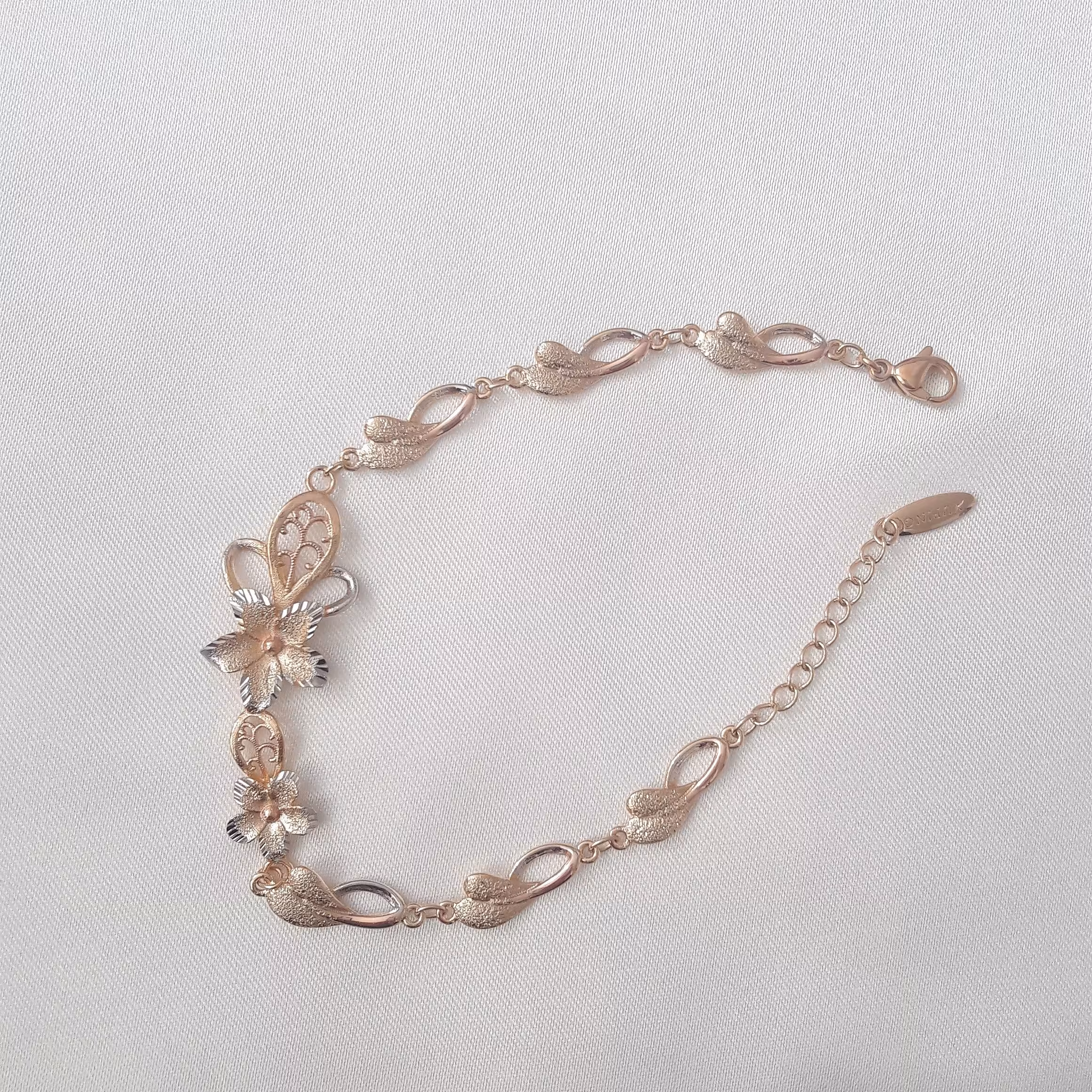 دستبند طرح گل. برند ژوپینگ.ابکاری قوی.گالری ویداس(ارسال رایگان )بدلیجات 