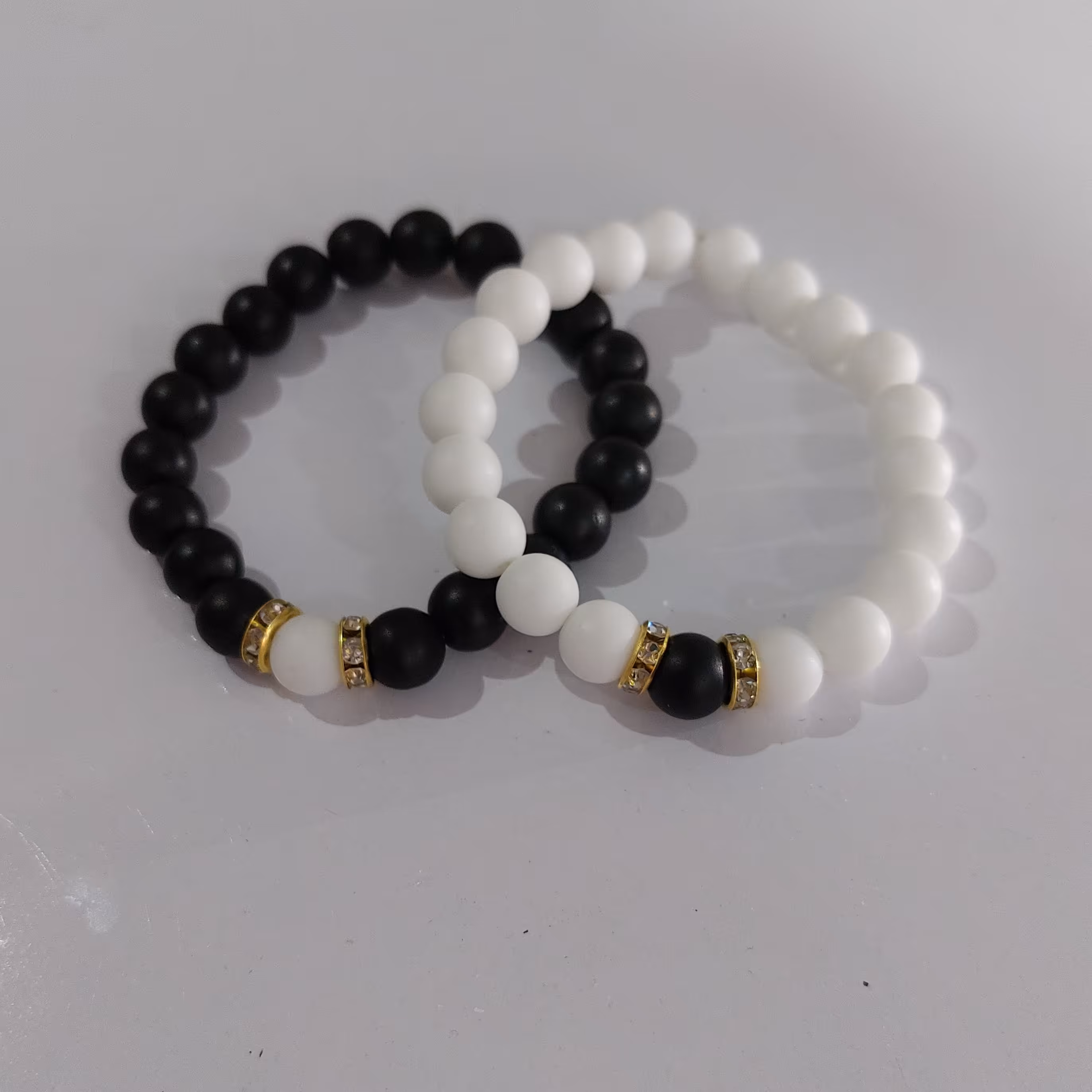 دستبند کشی مدل ست دوستی 2 عددی سیاه مات و سفید مات 