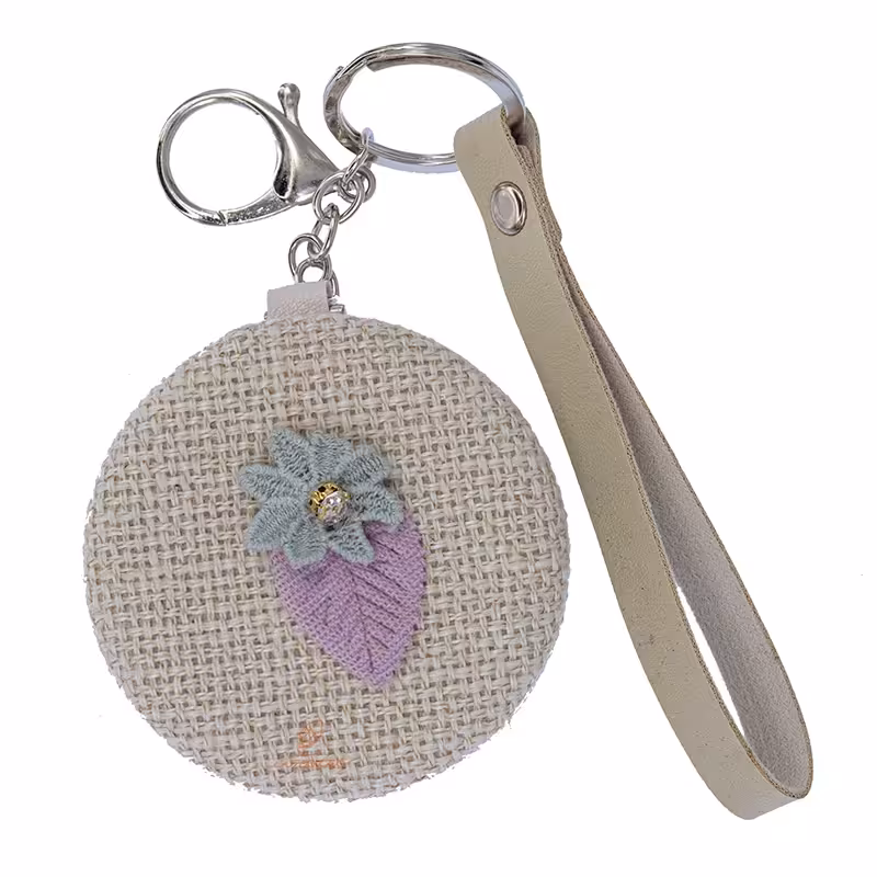 آینه گرد جیبی (آرایشی) فانتزی پارچه ای کرم طرح گل 075