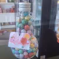 شکلات دراژه با مغزی غلات حجیم شده (مدل لامپی)