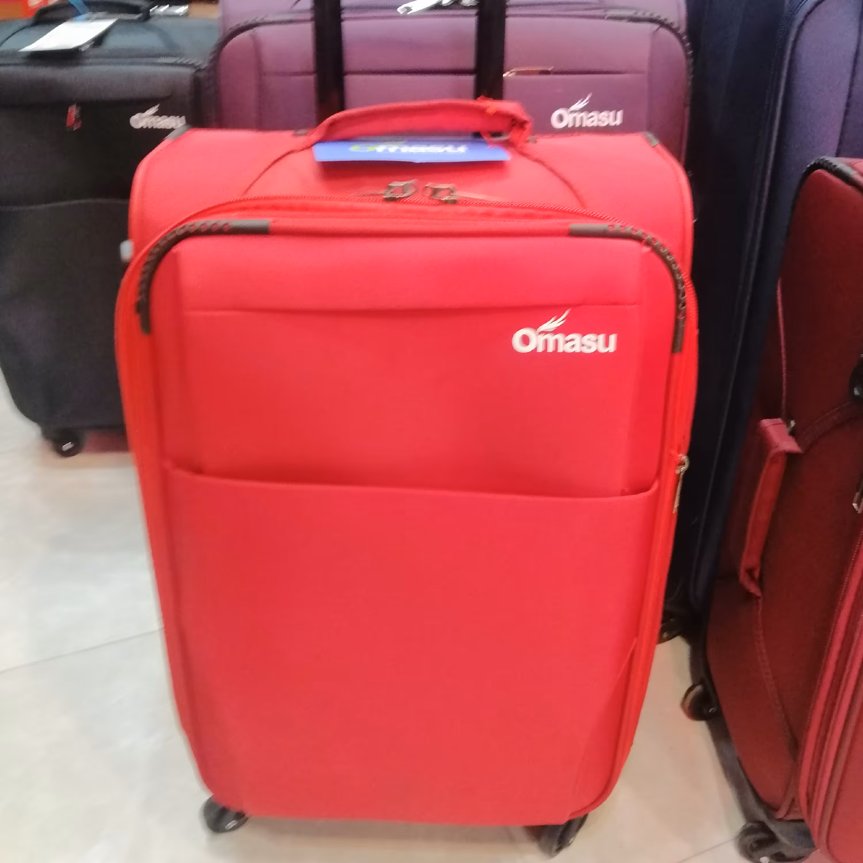 چمدان اوماسو طرح کت.. 