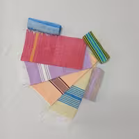 حوله دست بافت مخملی در رنگ های شیری خاکی سبز فسفری یاسی پیازی صورتی و آبی