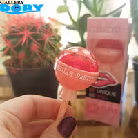 رژلب مدل تینت آبنبات چوبی صورتی