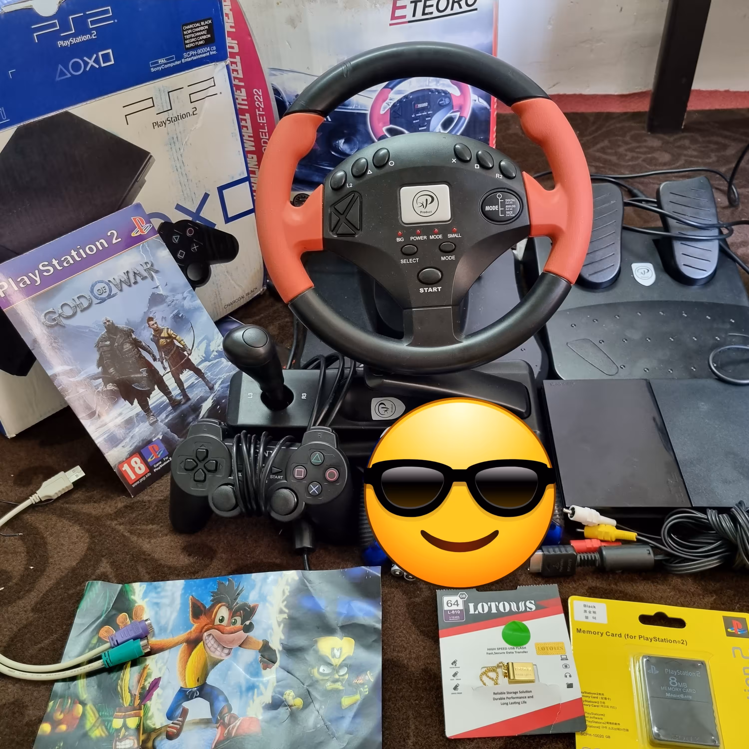 پلی استیشن 2  دو دسته همراه فرمون بازی و فلش 64 مموری کارت 