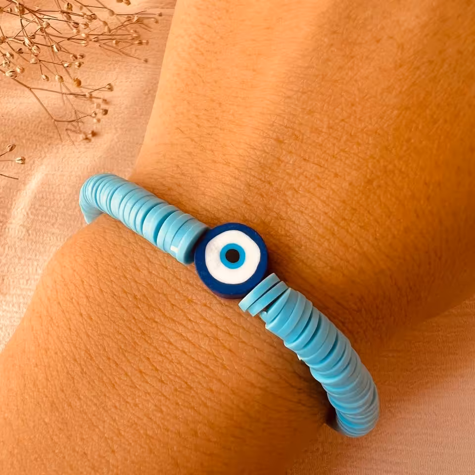 دستبند فیمو آبی با مهره چشم نظر سورمه ای