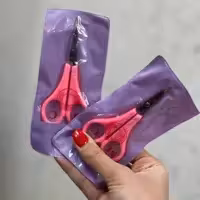 قیچی ابرو دسته صورتی