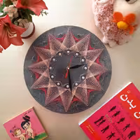 ساعت گرد طوسی صورتی