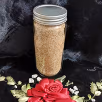 کنجد قهوه ای دستچین 340 گرمی در ظرف شیشه ای