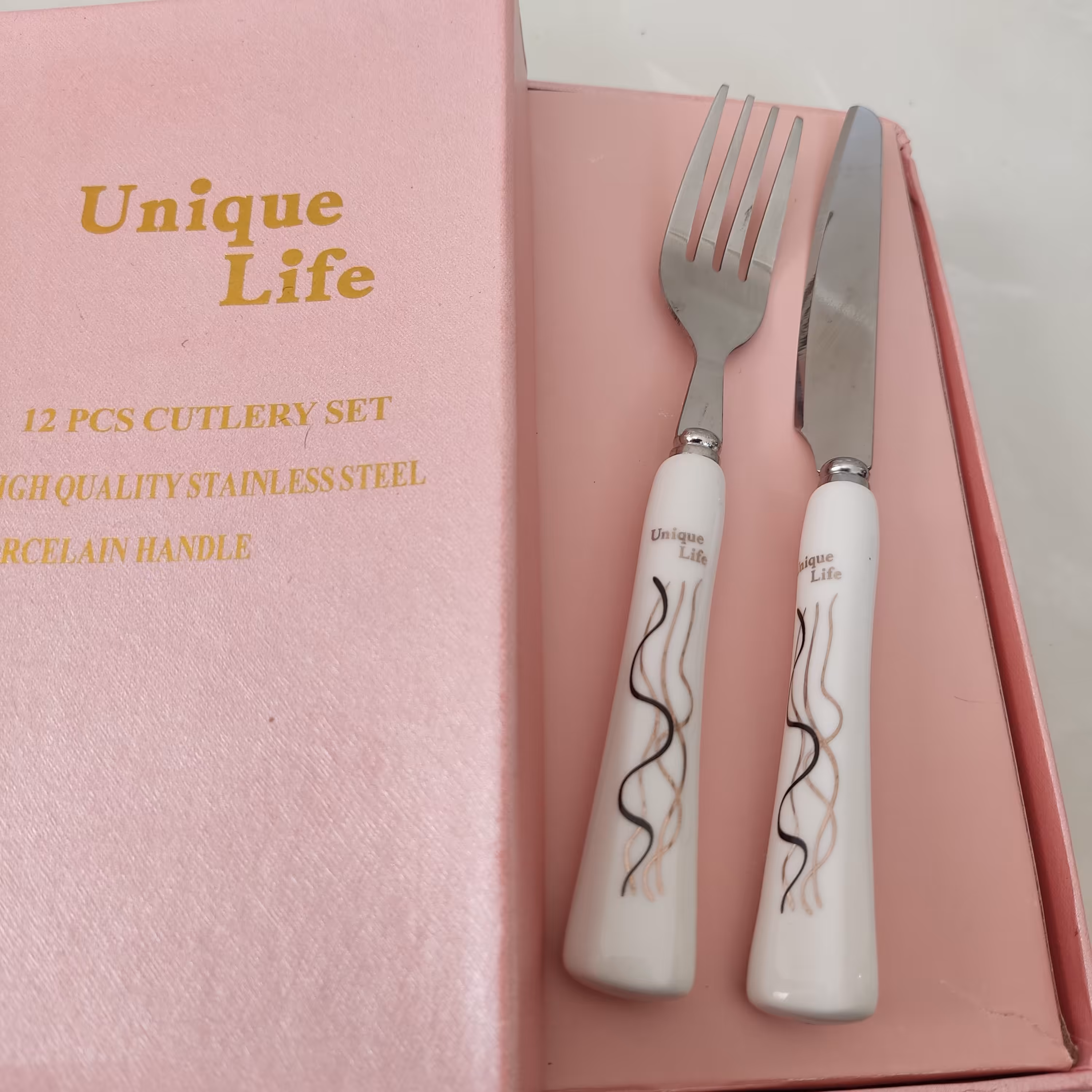 کارد و چنگال سرامیکی مارک یونیک لایف Unique life بسته 12 عددی 6عدد کارد ( چاقو)میوه خوری و6عدد چنگال میوه خوری  جنس عالی