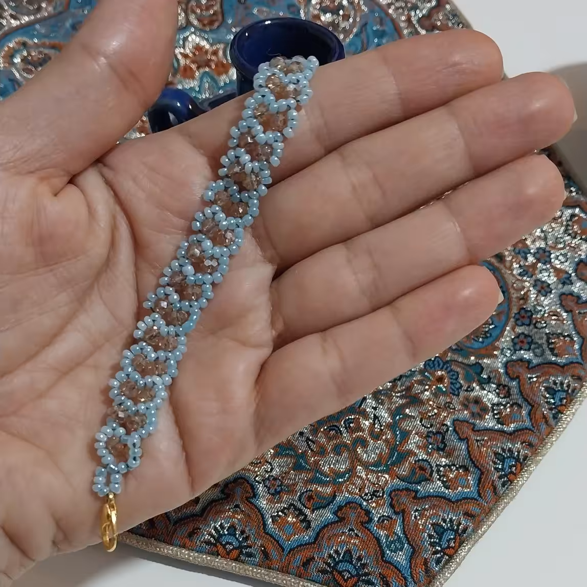 دستبند منجوق کریستال مدل قلب آبی کم رنگ