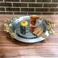 سینی استیل نگارکد 417 گرد کوچک مدل گلستان نقره ای دسته طلایی 