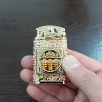 فندک روکش طلا بهمراه با شناسنامه اصالت کالا و جعبه ارجینال  