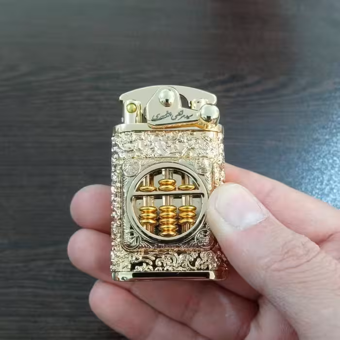 فندک روکش طلا بهمراه با شناسنامه اصالت کالا و جعبه ارجینال  