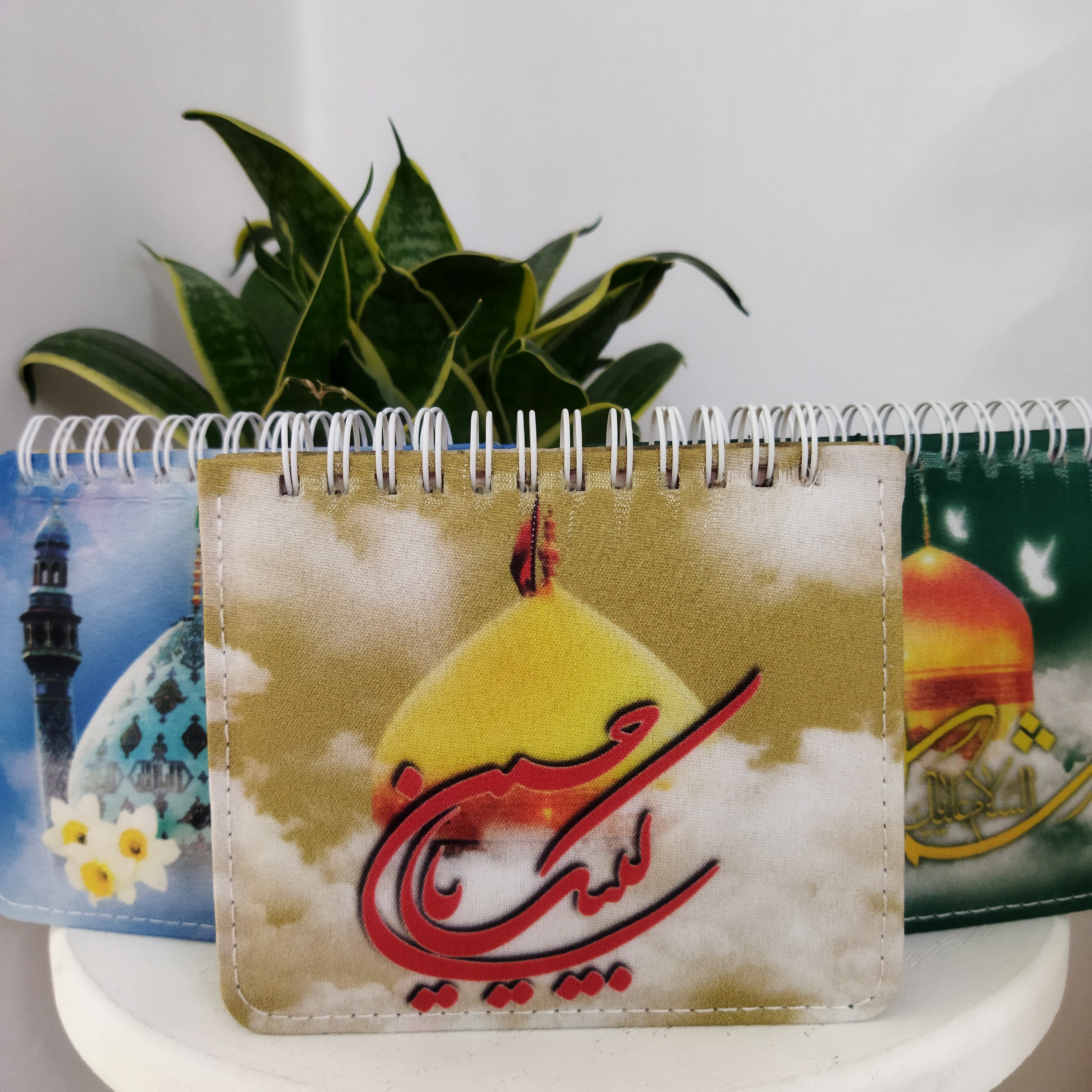 دفترچه با جلد پارچه ای طرح های اهل بیتی کد 014 (بسته ده عددی)