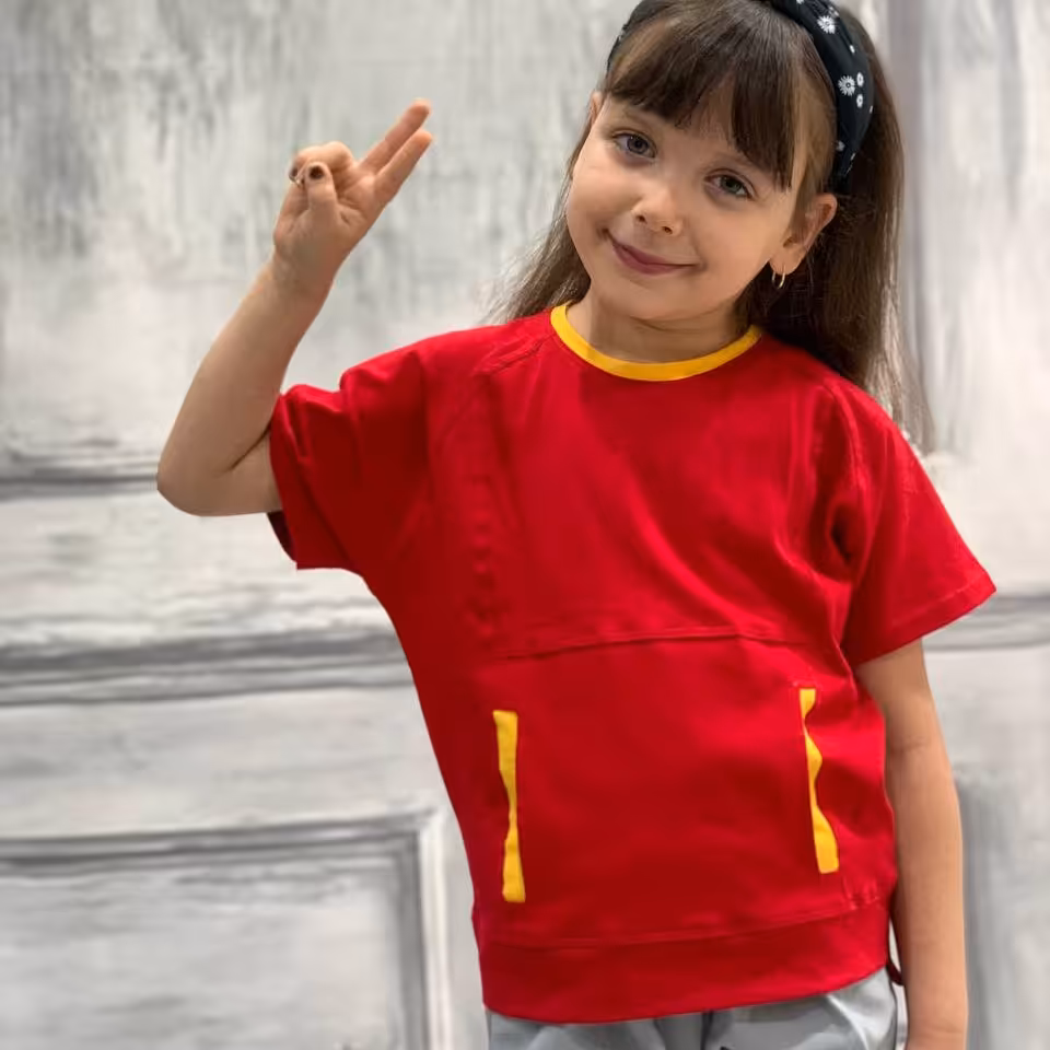 لباس بچگانه تیشرت اسپرت دخترانه و پسرانه تک رنگ قرمز 