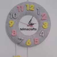 خرید ساعت دیواری اتاق کودک طرح فیل نمدی سیسمونی نوزاد 