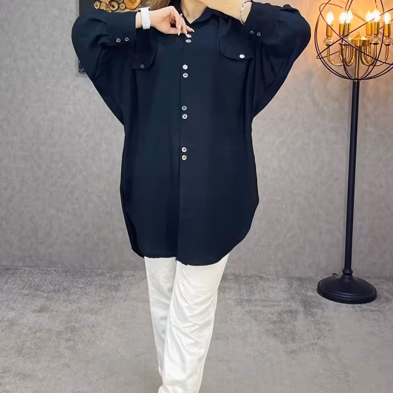 تونیک مانتویی آستین کیمونو دو دکمه ای تک رنگ مشکی و فری سایز تا حدود سایز 46(قبل از سفارش از غرفه دار موجودی گرفته شود)