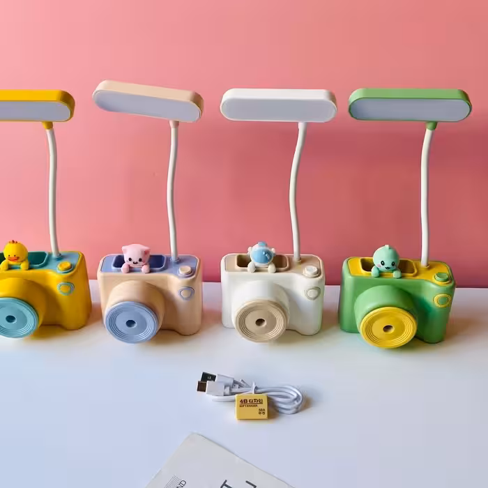 چراغ مطالعه یا چراغ خواب شارژی طرح دوربین فانتزی وارداتی تراش دار پاک کن جامدادی سه کاره یو اس بی دار وارداتی