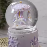 گوی موزیکال تک شاخ کاروسل در دورنگ بنفش 