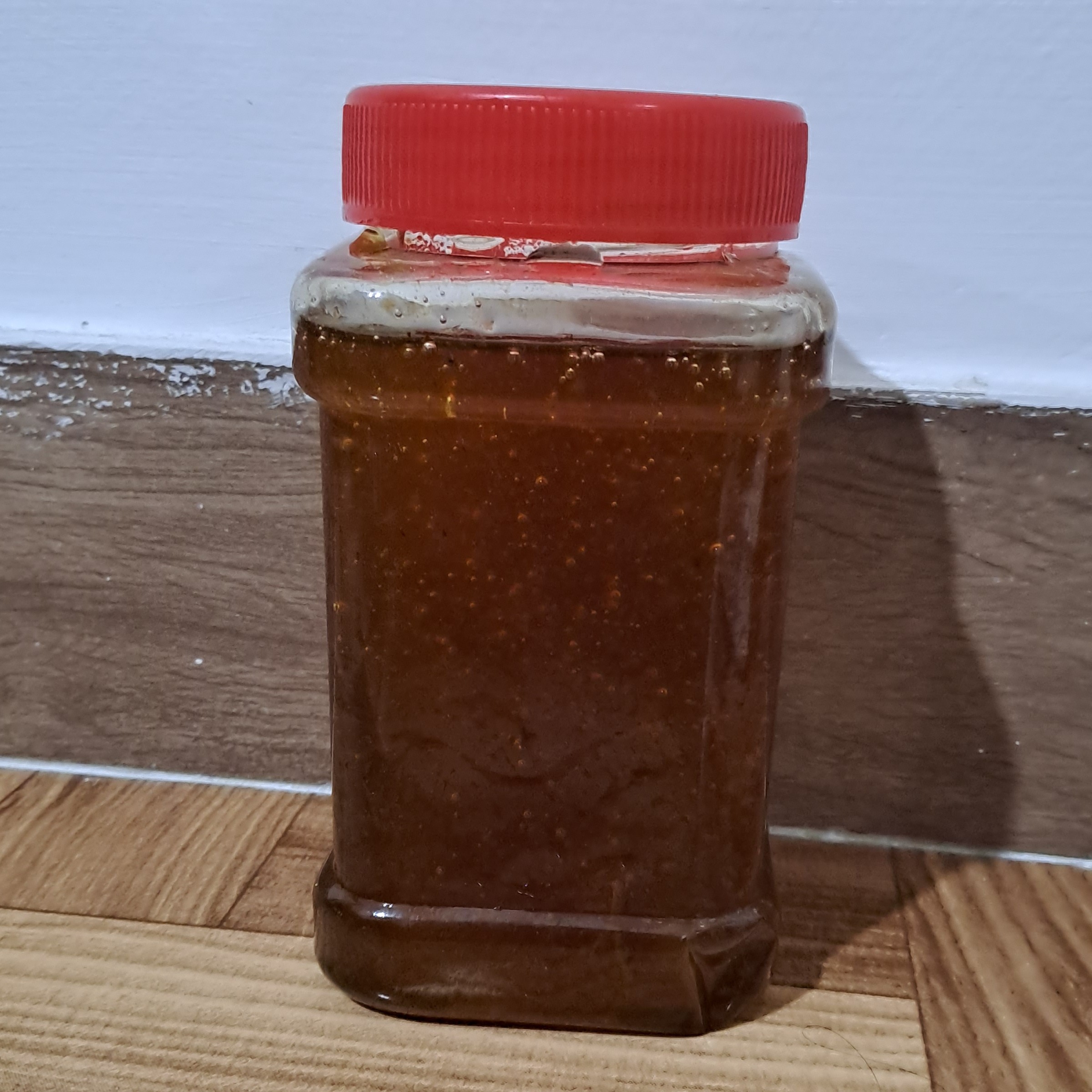 عسل سیاهمزگی 2کیلویی