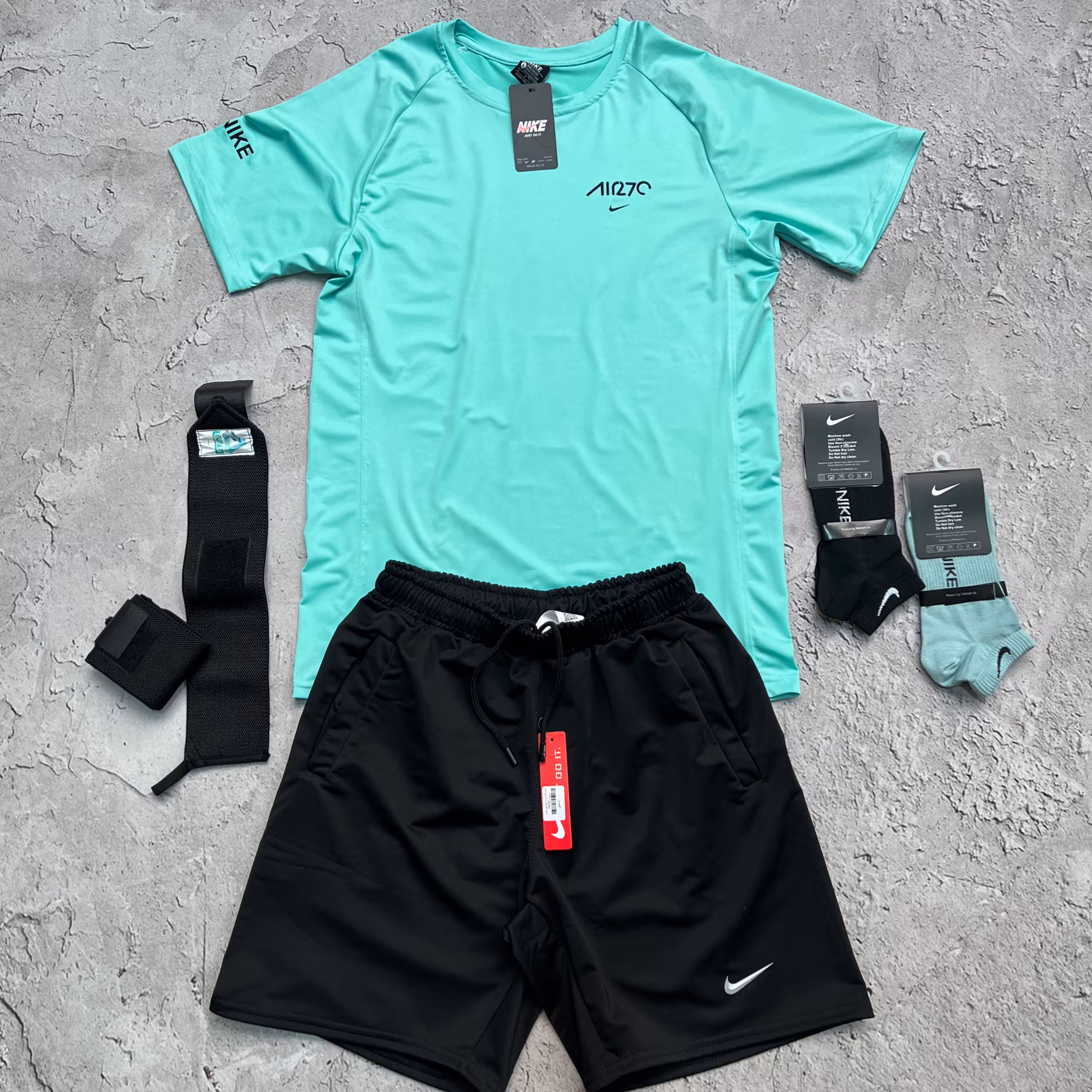 ست تیشرت AIR27 لاکرا کش  و شلوارک غواصی چاپ برجسته  برندNIKE   رنگ آبی فیروزه ای