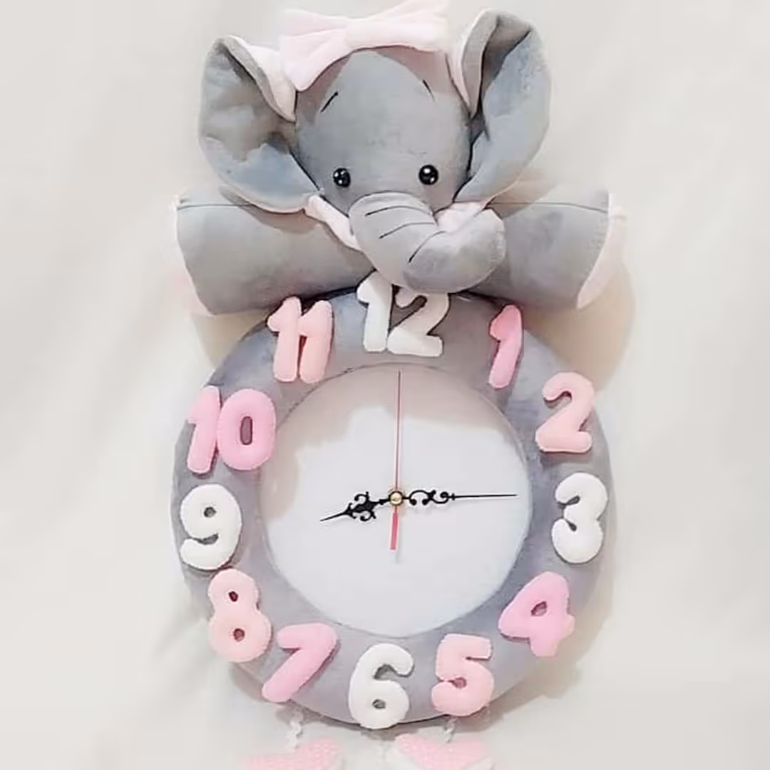 ساعت دیواری عروسکی طرح فیل نانان دخترونه جنس مخمل 