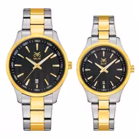 ست ساعت مچی عقربه ای زنانه و مردانه اوبلاک مدل 72703رنگ دو رنگ صفحه مشکی