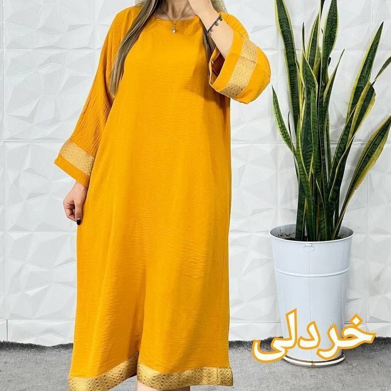 مانتو زنانه ساحلی ملکه جنس ابروبادی گرم بالا همراه با خرج کار طلایی