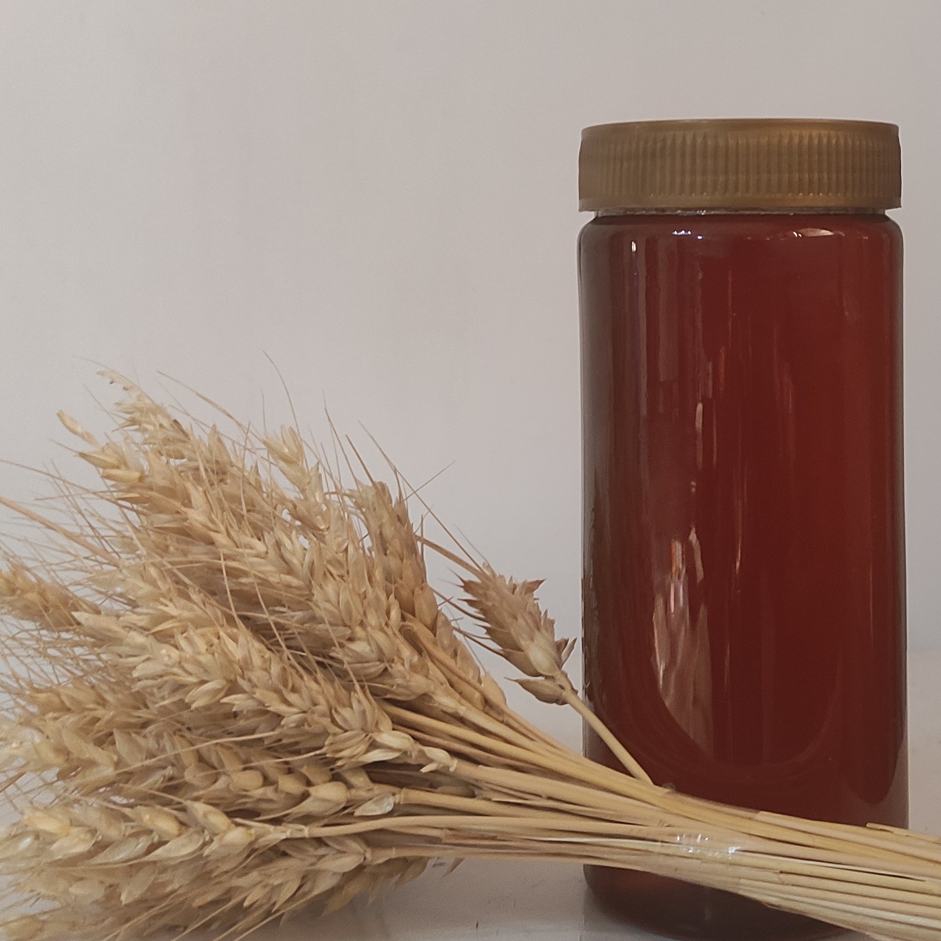 عسل گشنیز طبیعی ویژه امسالی (یک کیلویی)