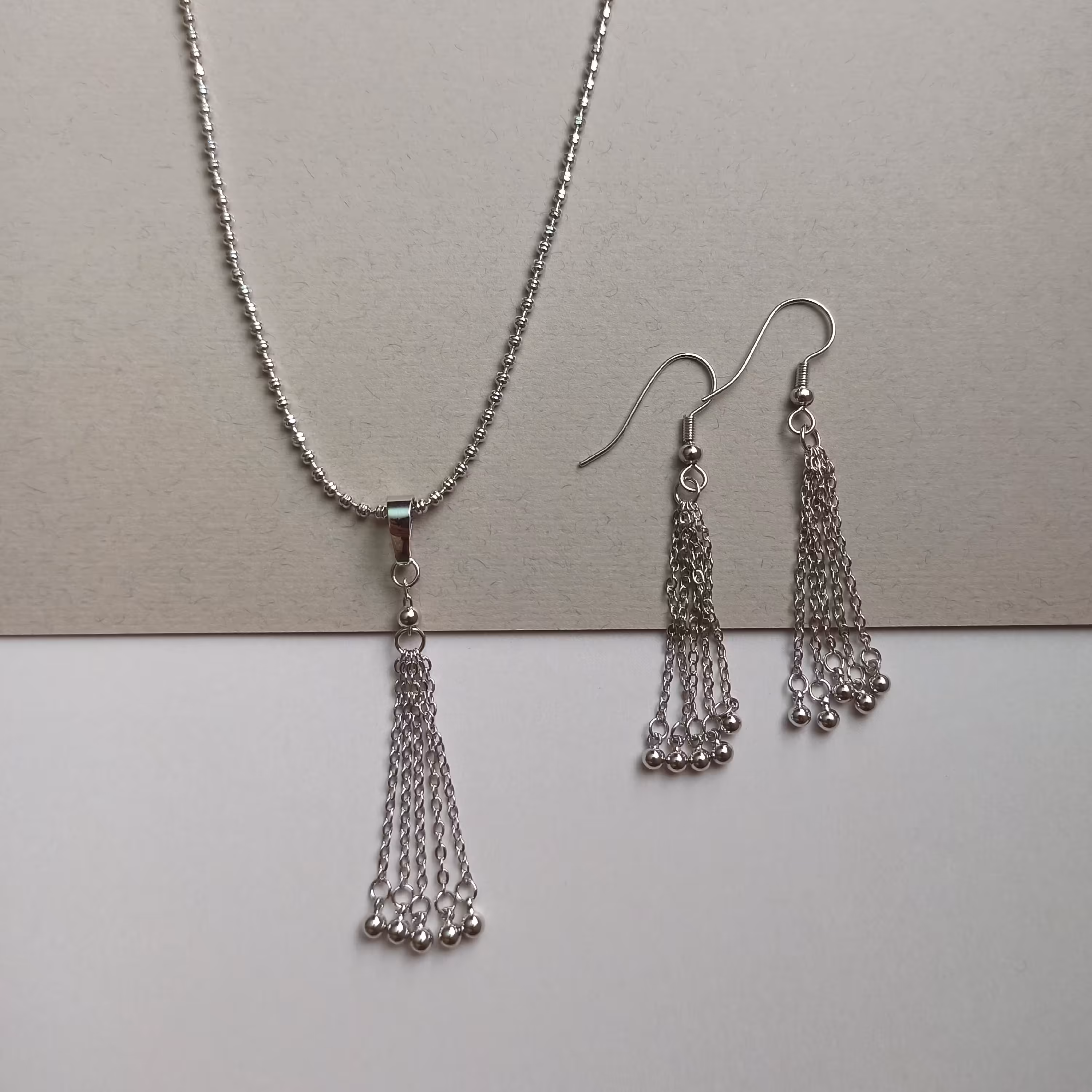 نیم ست نقره ای اویزی 