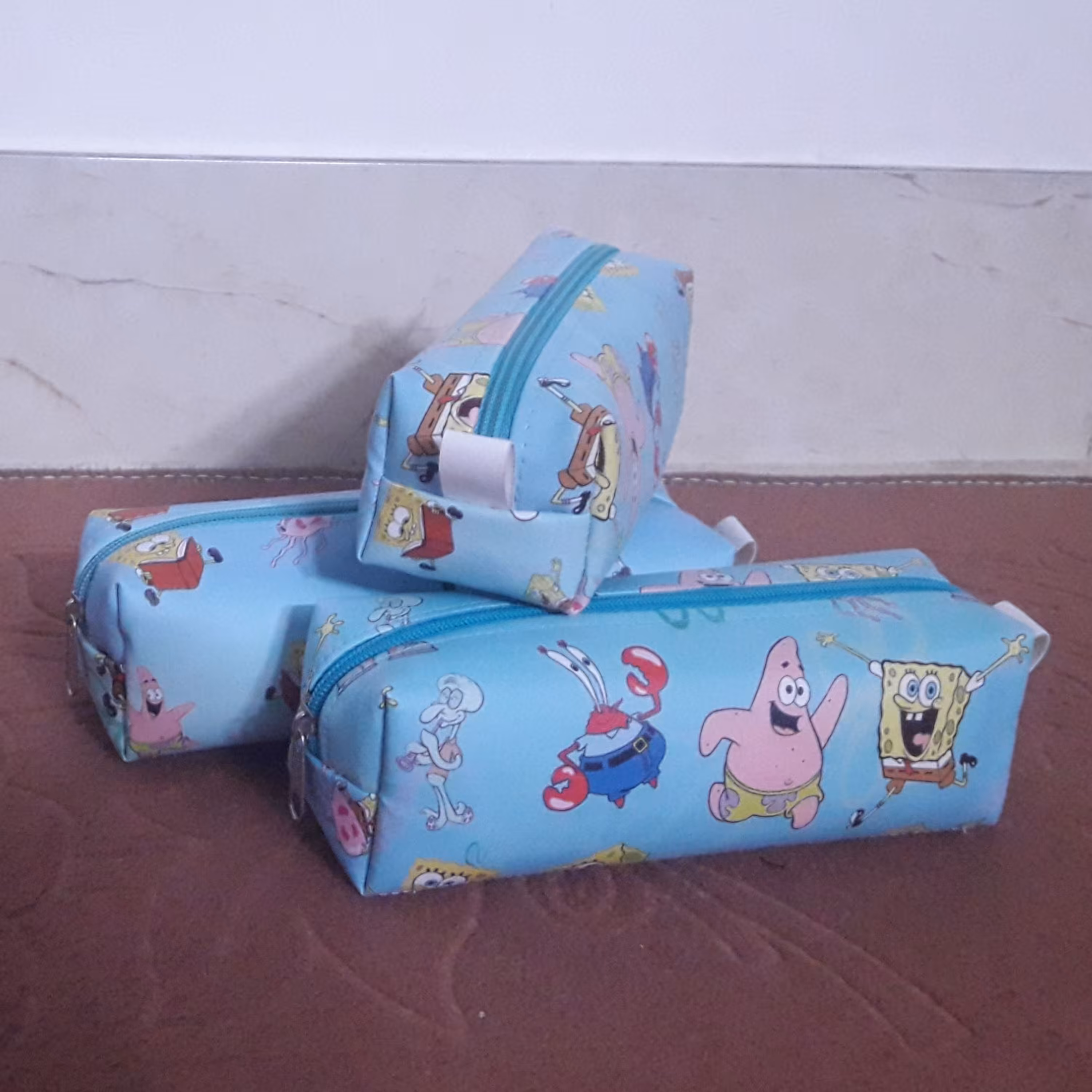 جامدادی .چرمی فانتزی.طرح باب اسفنجی. دارای فوم و آستر.  کد  