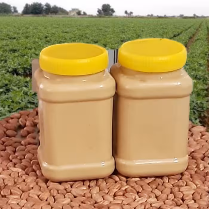 کره بادام زمینی محلی آستانه اشرفیه درجه یک  (800گرمی  ) بدون مواد افزودنی