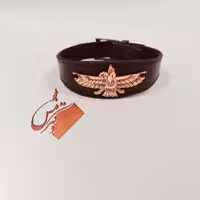 دستبند چرم طبیعی طرح فروهر قلمزنی شده 