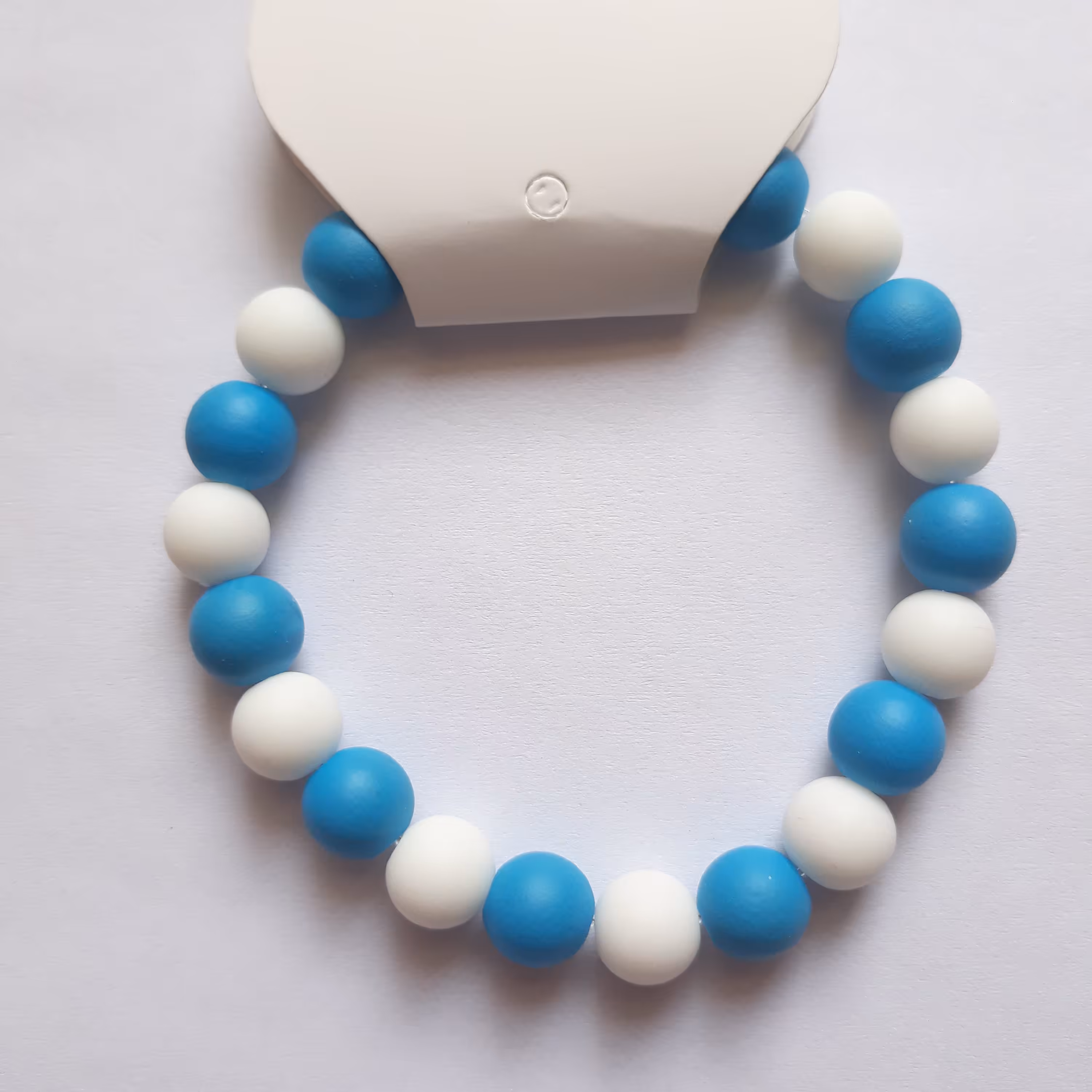 دستبند کشی  دو رنگ آبی و سفید