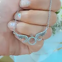 گردنبند نقره خارجی طرح بال فرشته و حلقه   15 میکرون ابکاری طلا سفید با بالاترین کیفیت موجود دربازار